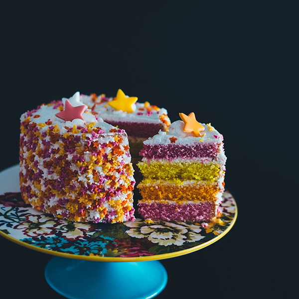 a photo of a rainbow cake