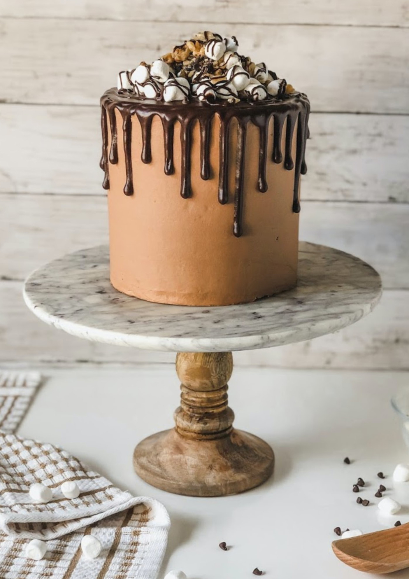 a photo of a chocolate popcorn marshmallow cake