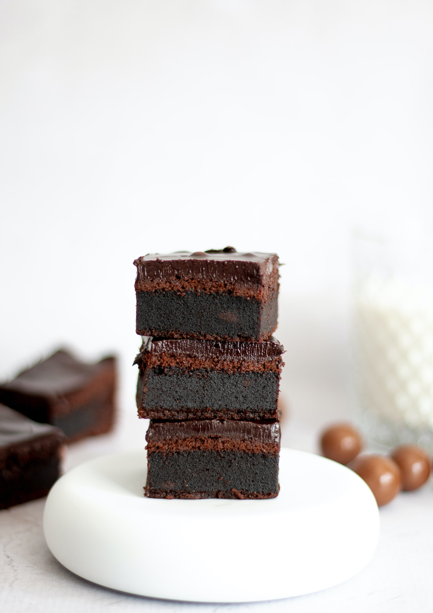 a photo of a stack of fudgy brownies